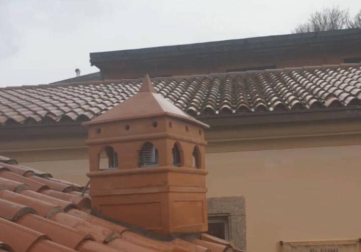 Why install a chimney cap instead of building one?